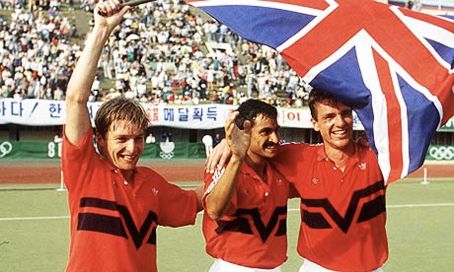 Great Britain's Richard Leman, left, Imran Sherwani, centre and Martyn Grimley celebrate their gold medal win over Australia at the 1988 Seoul Olympics. Photograph: BTS